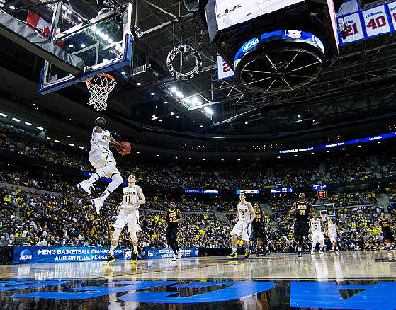 Tim Hardaway Jr. (10), Nik Stauskas (11), Spike Albrecht (2), Trey Burke (3), and Mitch McGary (4)