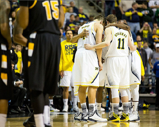 Mitch McGary (4) and Nik Stauskas (11)