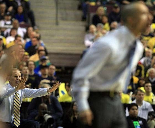 John Beilein and Virginia Commonwealth Head Coach Shaka Smart