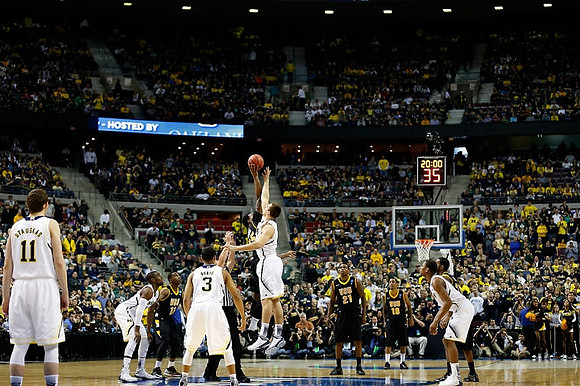 Nik Stauskas (11), Tim Hardaway Jr. (10), Trey Burke (3), Mitch McGary (4), and Glenn Robinson III (1)