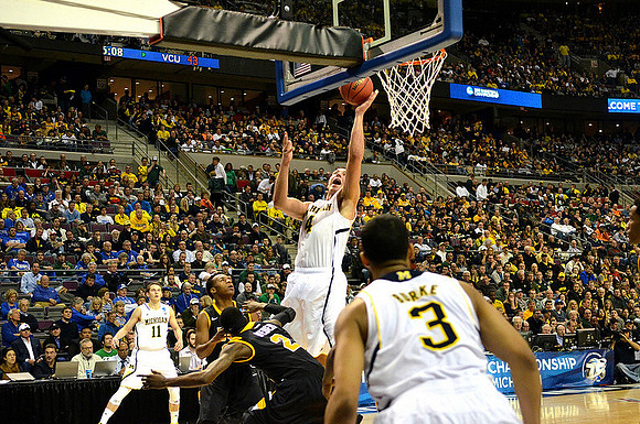 Nik Stauskas (11), Mitch McGary (4), and Trey Burke (3)