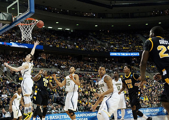 Glenn Robinson III (1), Nik Stauskas (11), Jon Horford (15), Trey Burke (3), and Tim Hardaway Jr. (10)