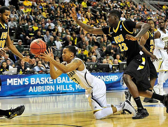 Trey Burke (3) and Tim Hardaway Jr. (10)