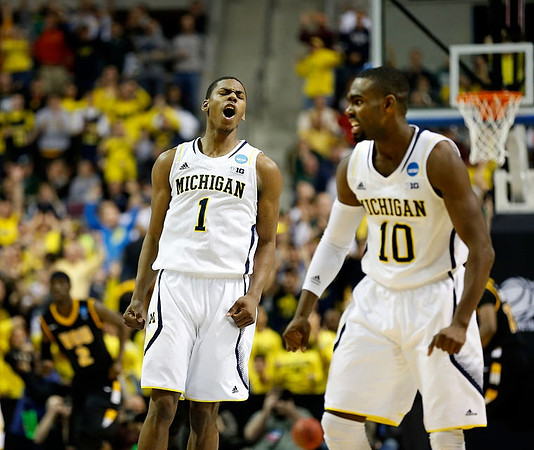 Glenn Robinson III (1) and Tim Hardaway Jr. (10)
