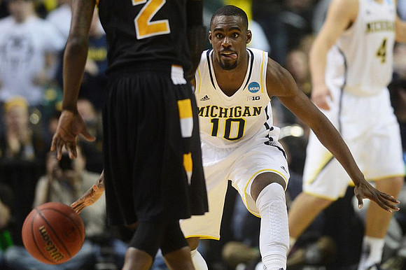 Tim Hardaway Jr. (10) and Mitch McGary (4)
