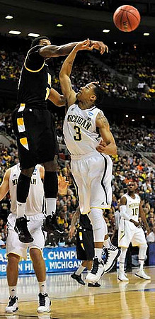 Mitch McGary (4), Trey Burke (3), and Tim Hardaway Jr. (10)