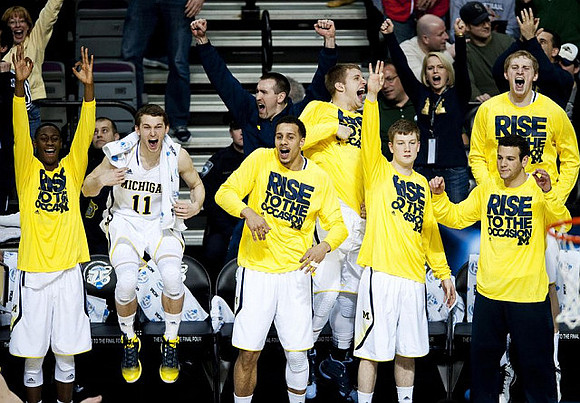 Caris LeVert (23), Nik Stauskas (11), Jordan Morgan (52), Max Bielfeldt (44), Matt Vogrich (13), Josh Bartelstein (20), and Spike Albrecht (2)