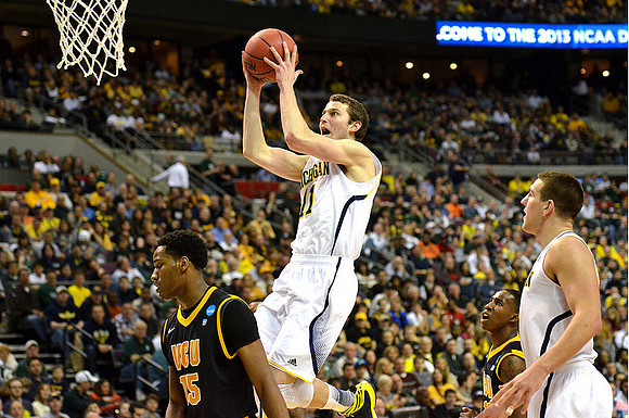 Nik Stauskas (11) and Mitch McGary (4)