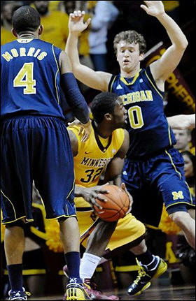 Darius Morris (4) and Zack Novak (0)