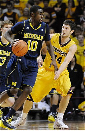 Evan Smotrycz (23) and Tim Hardaway Jr. (10)
