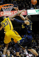Jordan Morgan (52) and Zack Novak (0)
