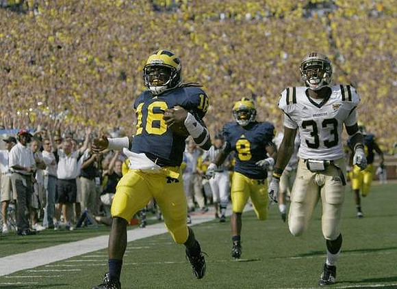 Denard Robinson (16) and Martavious Odoms (9)