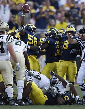 Brandon Herron (58), Stevie Brown (3), Jonas Mouton (8), and Obi Ezeh (45)