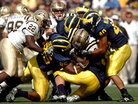 Kenny Demens (25) and Michael Williams (40)