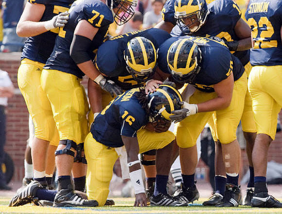 Mark Huyge (72), Mark Ortmann (71), Stephen Schilling (52), David Molk (50), Denard Robinson (16), Greg Mathews (13), and Darryl Stonum (22)