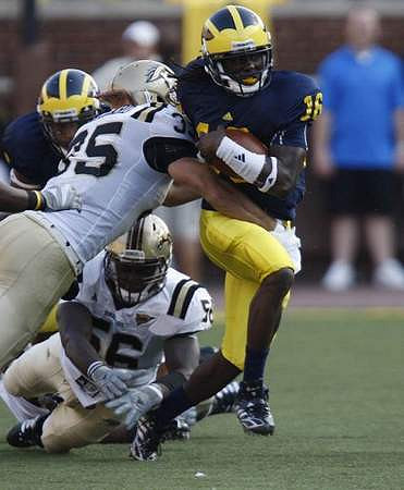 Denard Robinson (16)