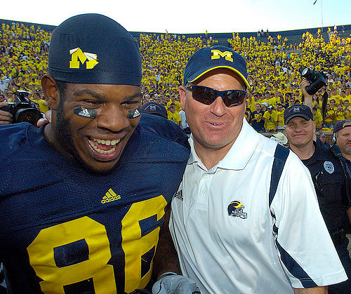 Kevin Koger (86) and Rich Rodriguez