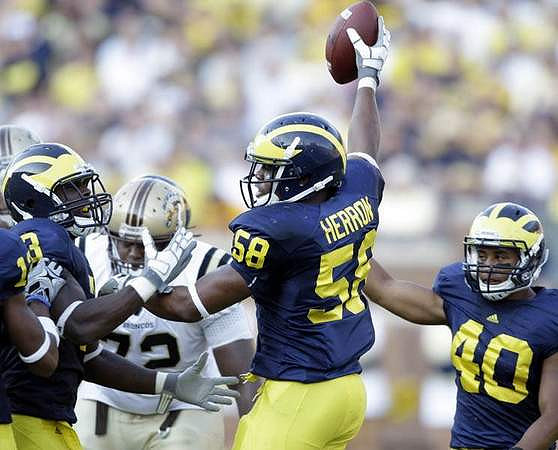 Stevie Brown (3), Brandon Herron (58), and Michael Williams (40)