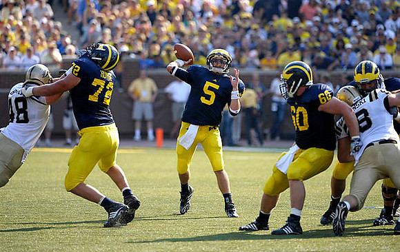 Mark Huyge (72), Tate Forcier (5), and David Moosman (60)