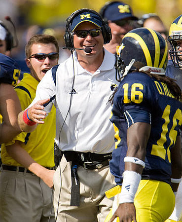 Rich Rodriguez and Denard Robinson (16)