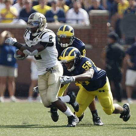 Brandon Herron (58) and Jonas Mouton (8)