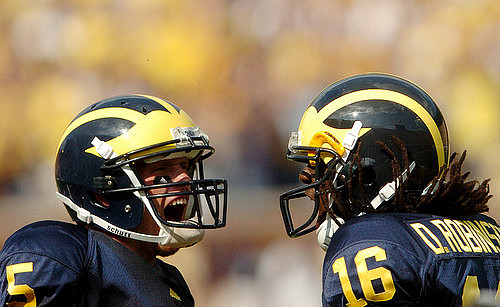 Tate Forcier (5) and Denard Robinson (16)