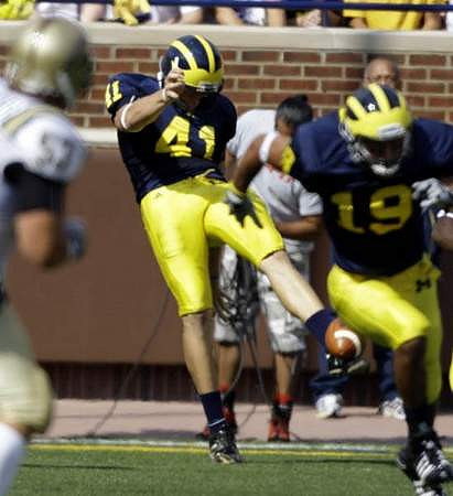 Zoltan Mesko (41) and Zac Johnson (19)