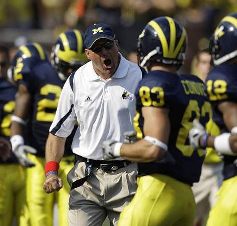 Rich Rodriguez and Jon Conover (83)