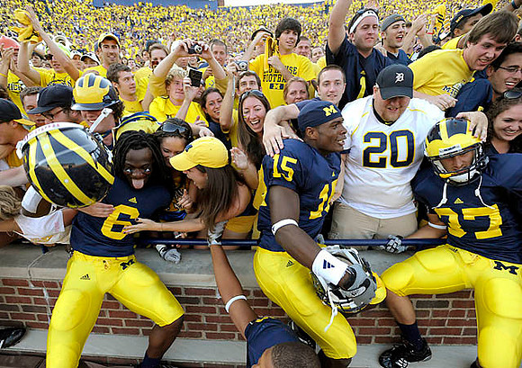 Je'Ron Stokes (6), Michael Cox (15), and Taylor Lewan (77)