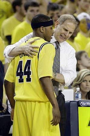 Kelvin Grady (44) and John Beilein