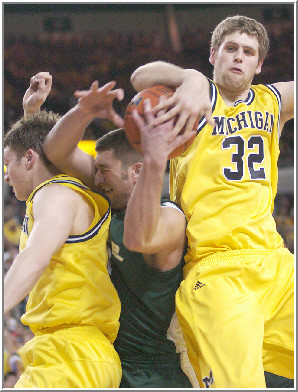 Zack Gibson (32) and Zack Novak (0)