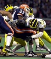 Larry Foote (17) and Julius Curry (26)