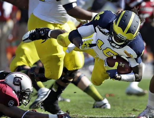Denard Robinson (16)