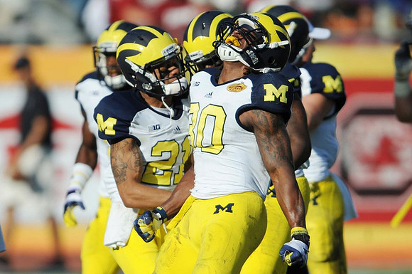Roy Roundtree (21) and Thomas Gordon (30)