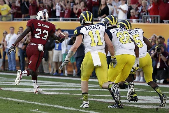 Jordan Kovacs (11), Jarrod Wilson (22), and Courtney Avery (5)
