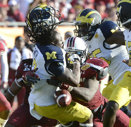 Vincent Smith (2) and Patrick Omameh (65)