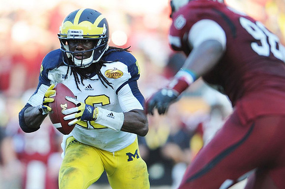 Denard Robinson (16)