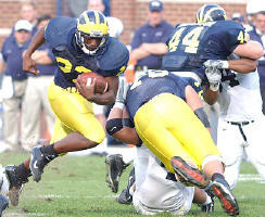 Chris Perry (23), Sean Sanderson (44), and Adam Stenavich (79)
