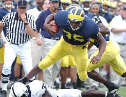 B.J. Askew (35) and WR Calvin Bell (27)
