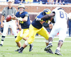 John Navarre (16) and Adam Stenavich (79)