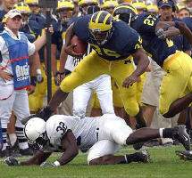 B.J. Askew (35) and Calvin Bell (27)
