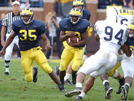 Chris Perry (23), B.J. Askew (35), and John Navarre (16)