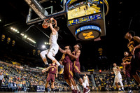 Moritz Wagner (13), Derrick Walton Jr. (10), and Zak Irvin (21)