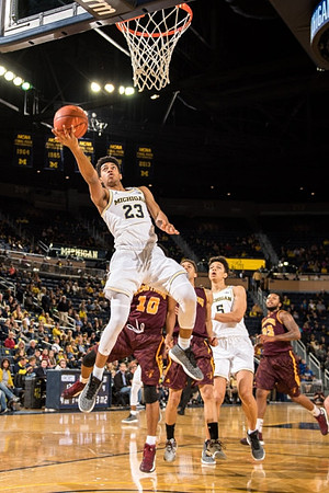 Ibi Watson (23) and D.J. Wilson (5)