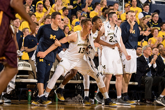 Andrew Dakich (11) , Moritz Wagner (13), Zak Irvin (21), and Sean Lonergan (20)