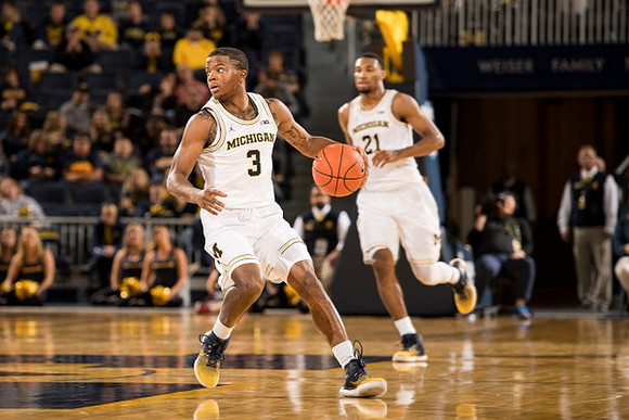 Xavier Simpson (3) and Zak Irvin (21)