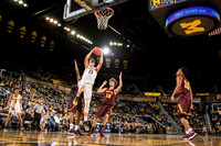 D.J. Wilson (5) and Moritz Wagner (13)