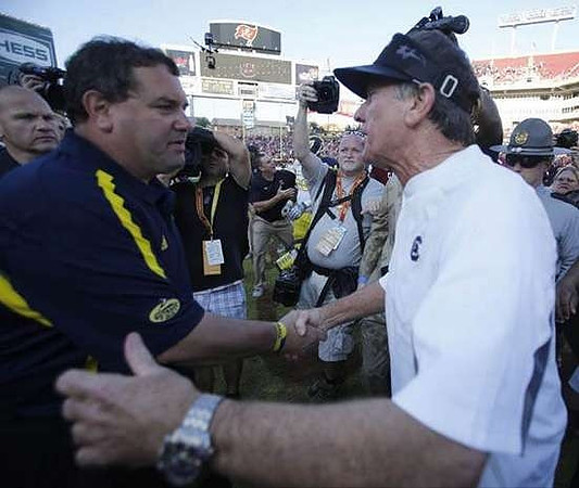 Brady Hoke and South Carolina Head Coach Steve Spurrier