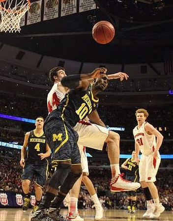 Mitch McGary (4) and Tim Hardaway Jr. (10)