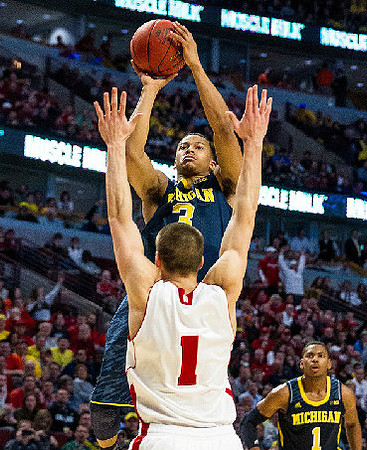 Trey Burke (3) and Glenn Robinson III (1)